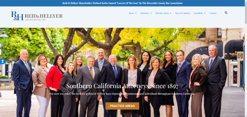 Group of attorneys from Reid & Hellyer law offices posing outdoors, showcasing professional attire and a welcoming demeanor, with greenery in the background, emphasizing their commitment to serving Southern California since 1897.